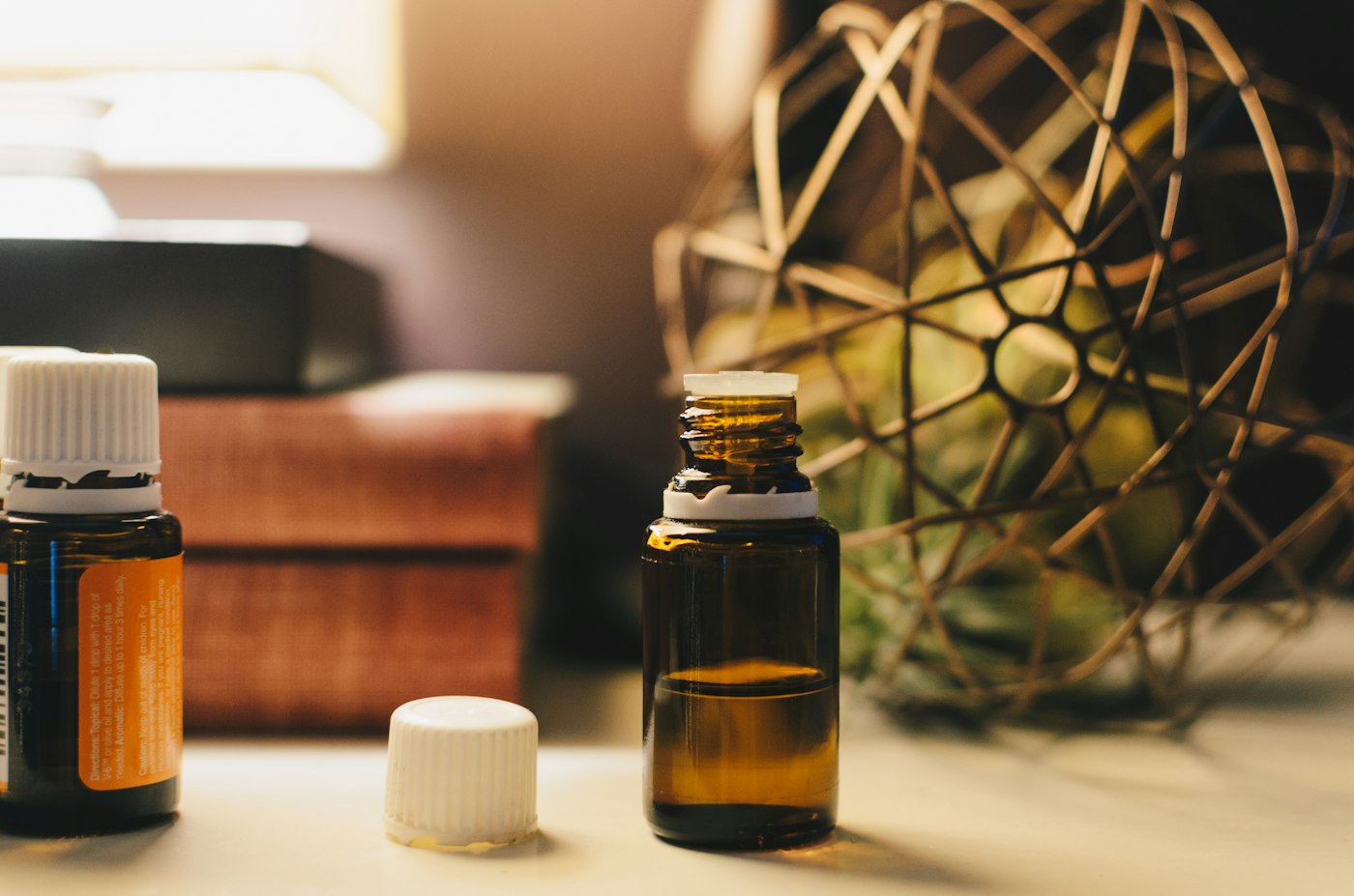 Massage services in Gilbert, AZ – amber essential oil bottles ready for a session